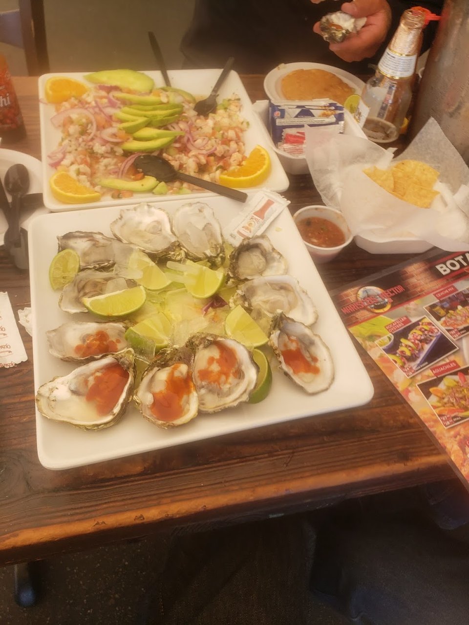 Restaurant menu with shrimp, steak, and seafood plates.
