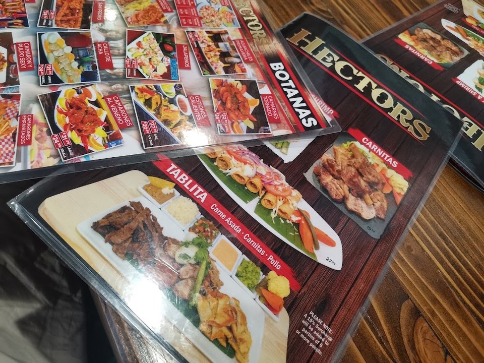 Menu page with seafood and Mexican dishes.