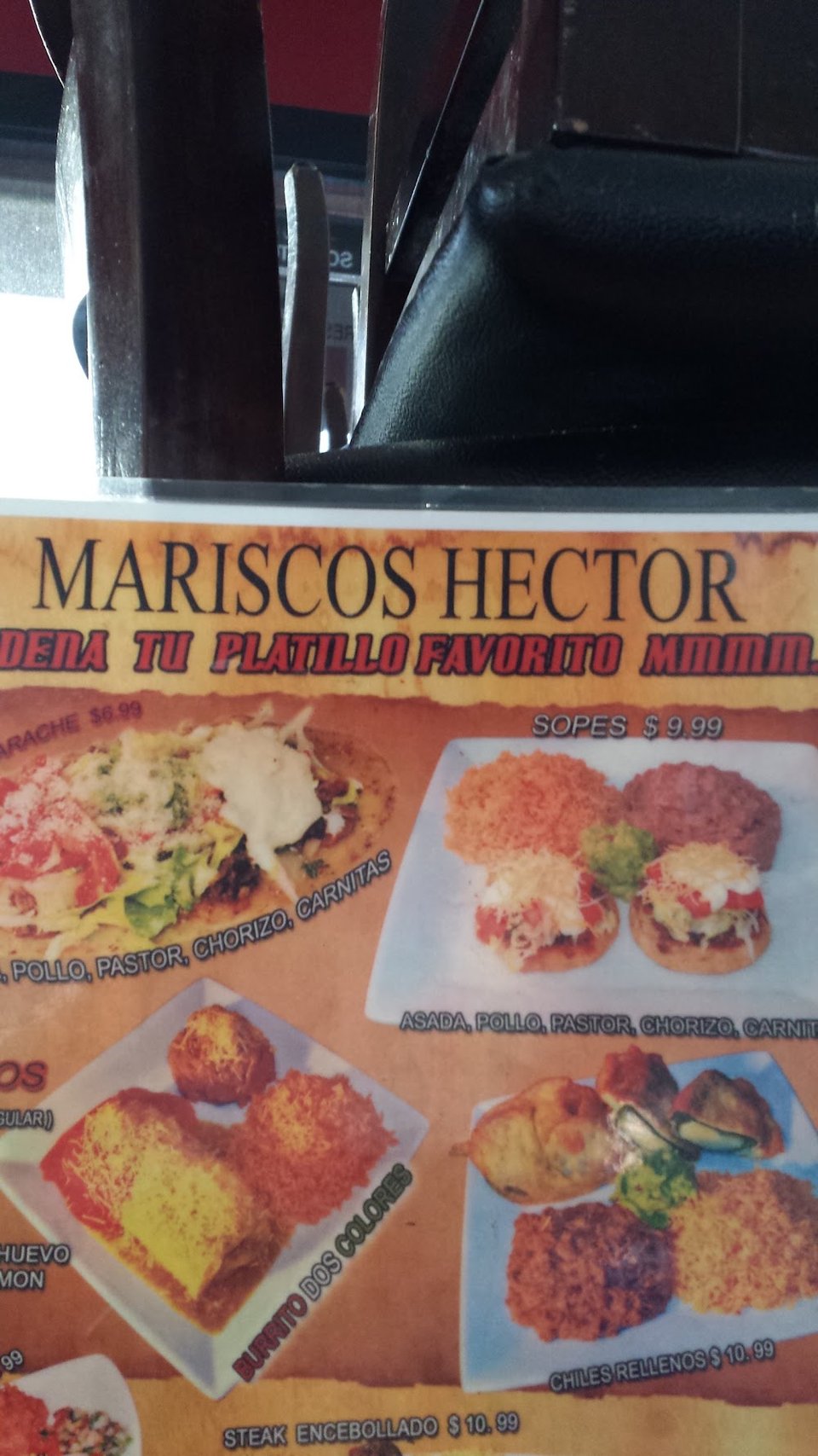 Restaurant menu with shrimp, steak, and seafood plates.